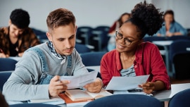 A man and a woman study together