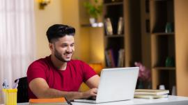 student studying ti improve his vocabulary for IELTS